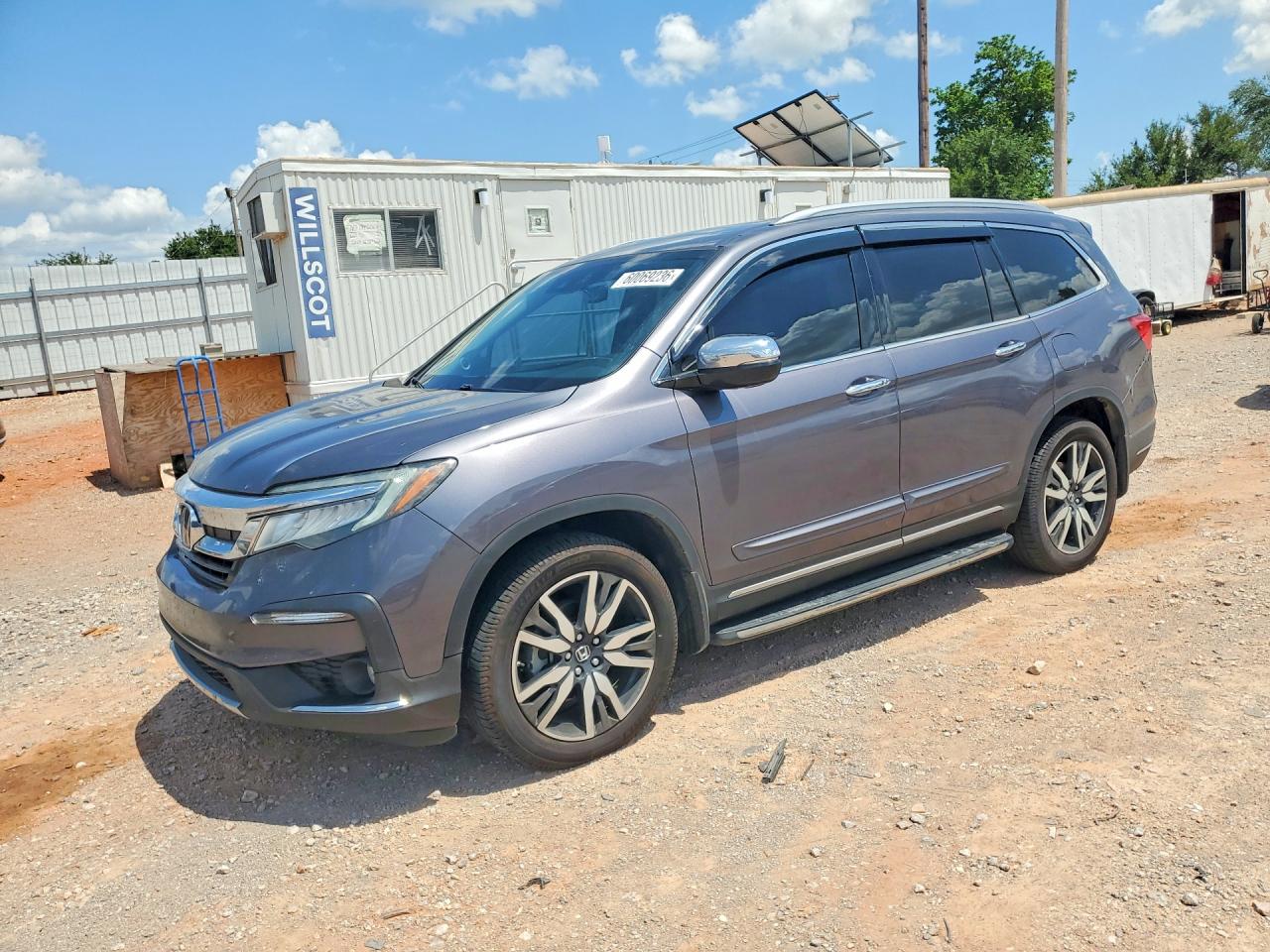 2021 Honda Pilot Touring 8-Passenger, VIN 5FNYF6H90MB009411 — Зад