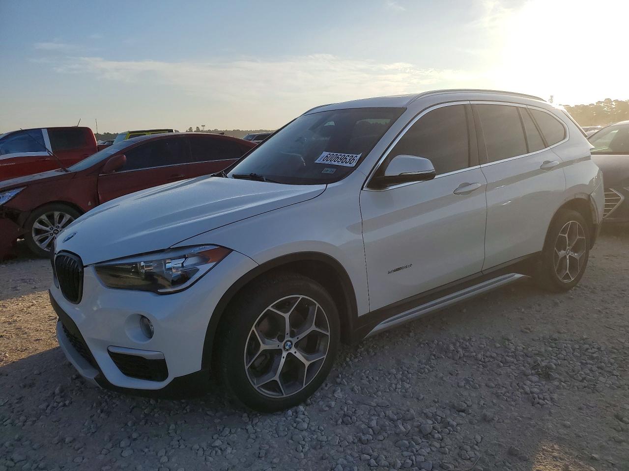 2018 BMW X1 sDrive28i, VIN WBXHU7C34J5H42983 — Rear end