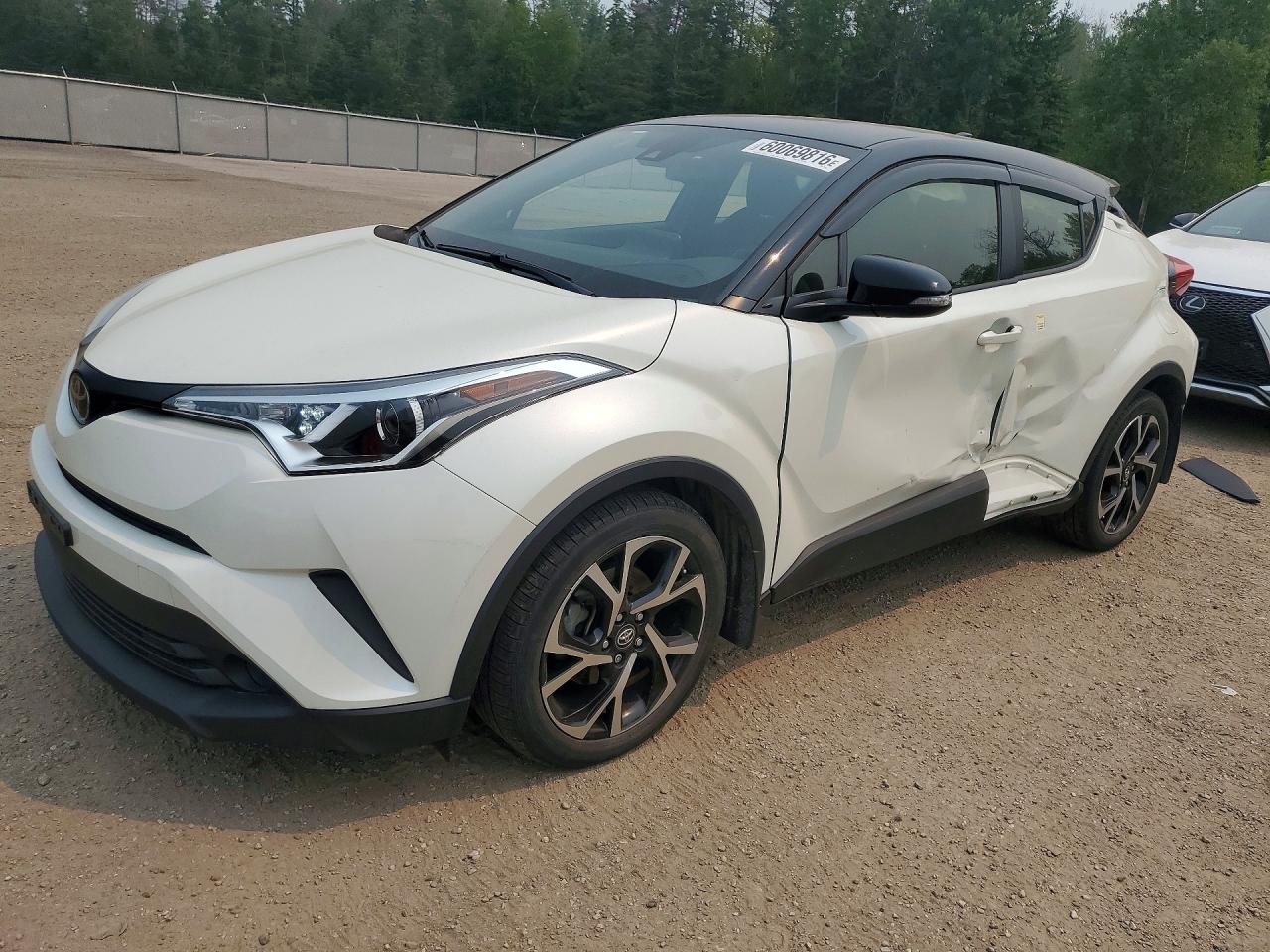 2019 Toyota C-HR LE, VIN JTNKHMBX2K1039149 — Бок