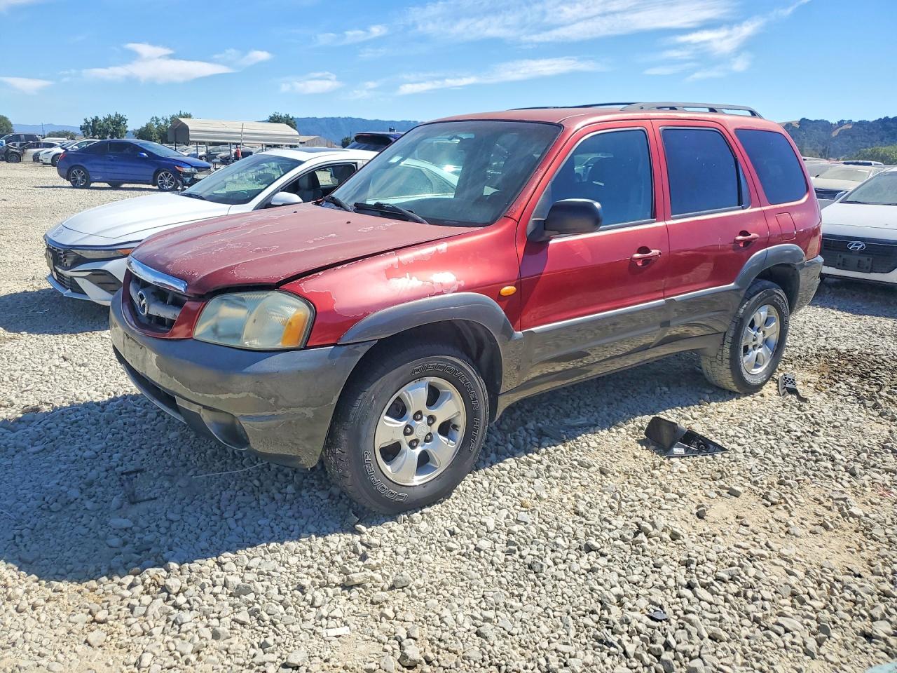 2003 Mazda Tribute LX, VIN 4F2YZ04123KM12313 — Мелкие вмятины и царапины