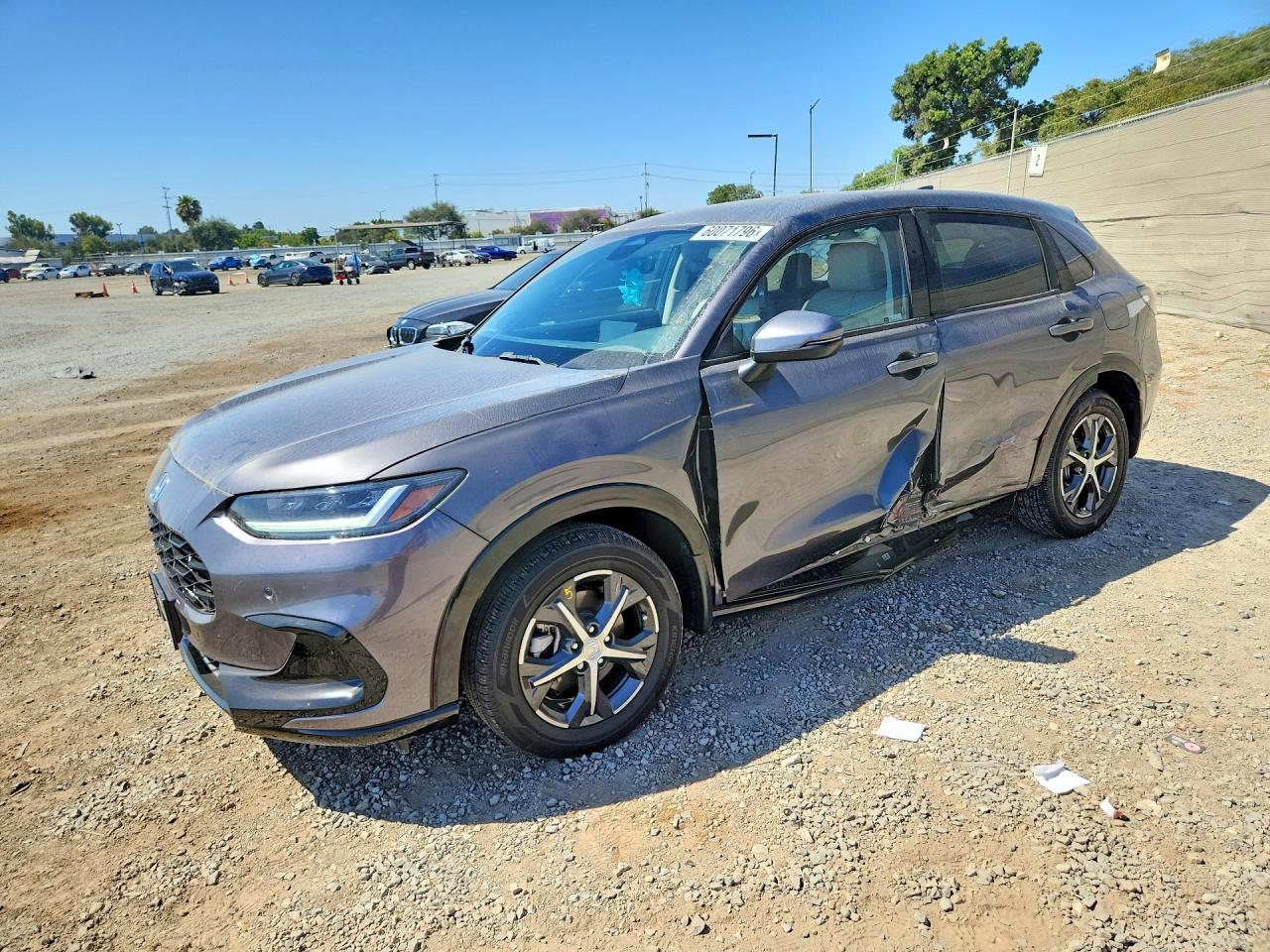 2024 Honda HR-V EX-L, VIN 3CZRZ1H77RM717309 — Бок