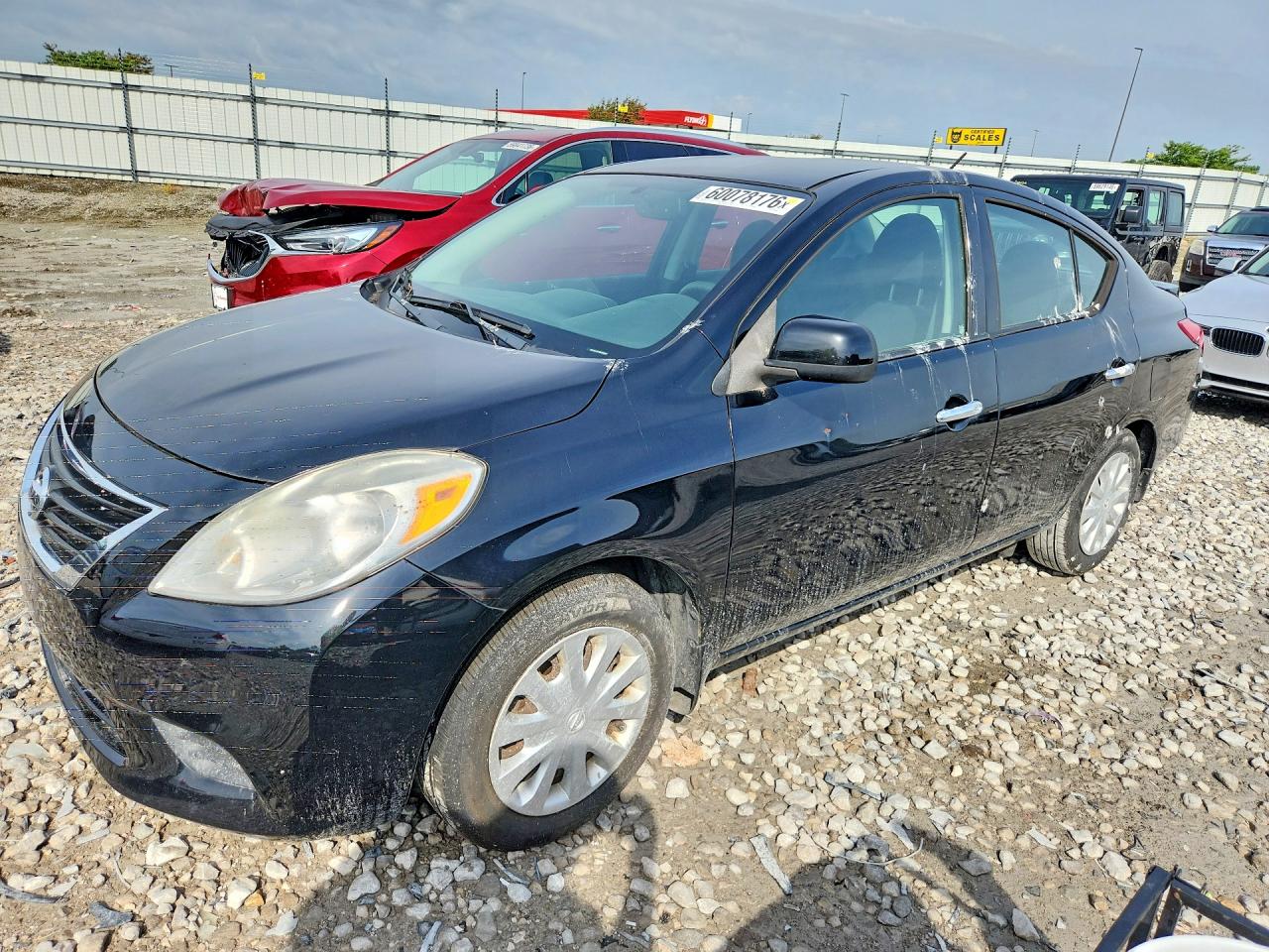 2014 Nissan Versa SV, VIN 3N1CN7AP7EL808605 — Water / flood