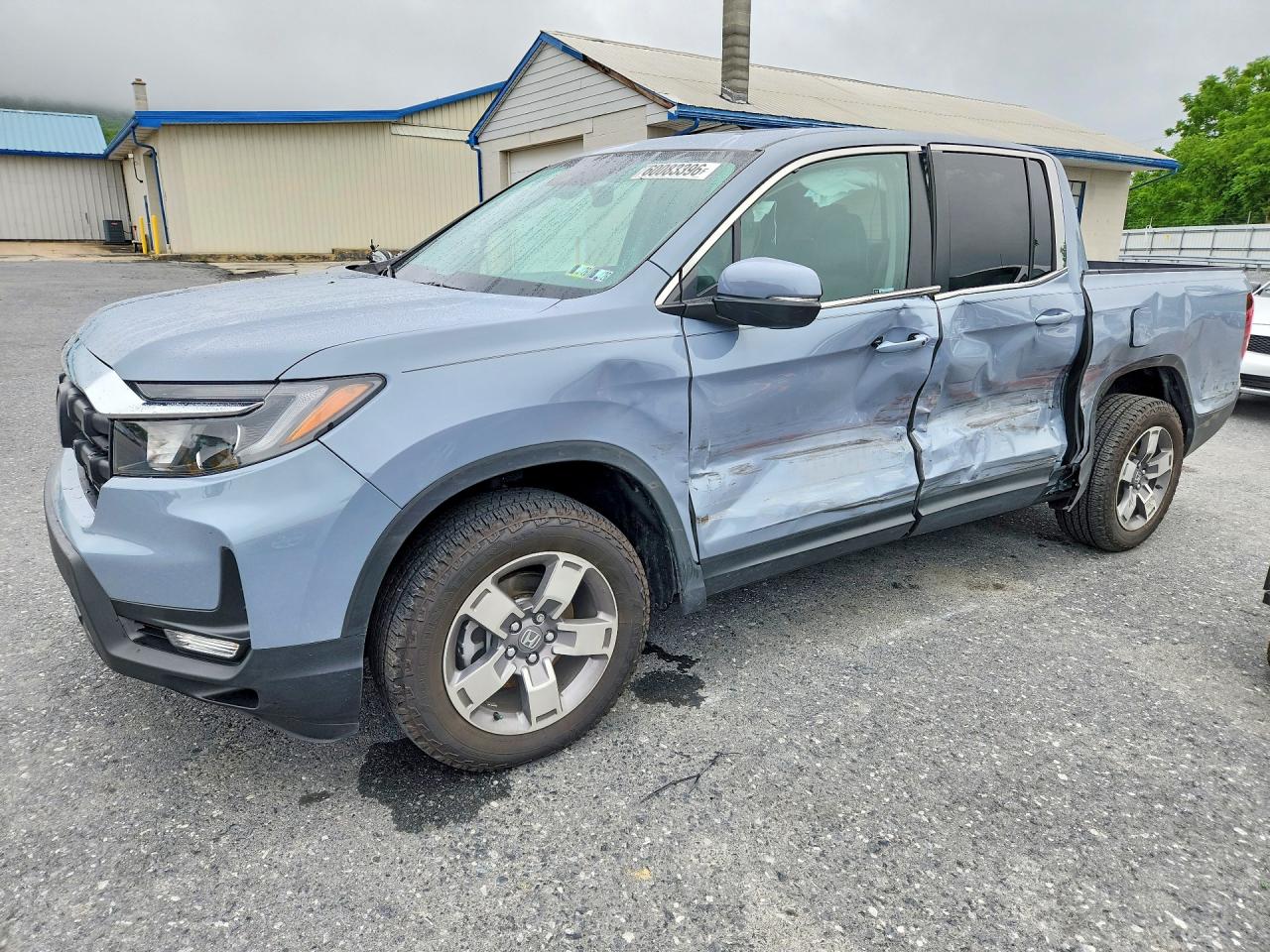 2024 Honda Ridgeline RTL, VIN 5FPYK3F52RB007314 — Side