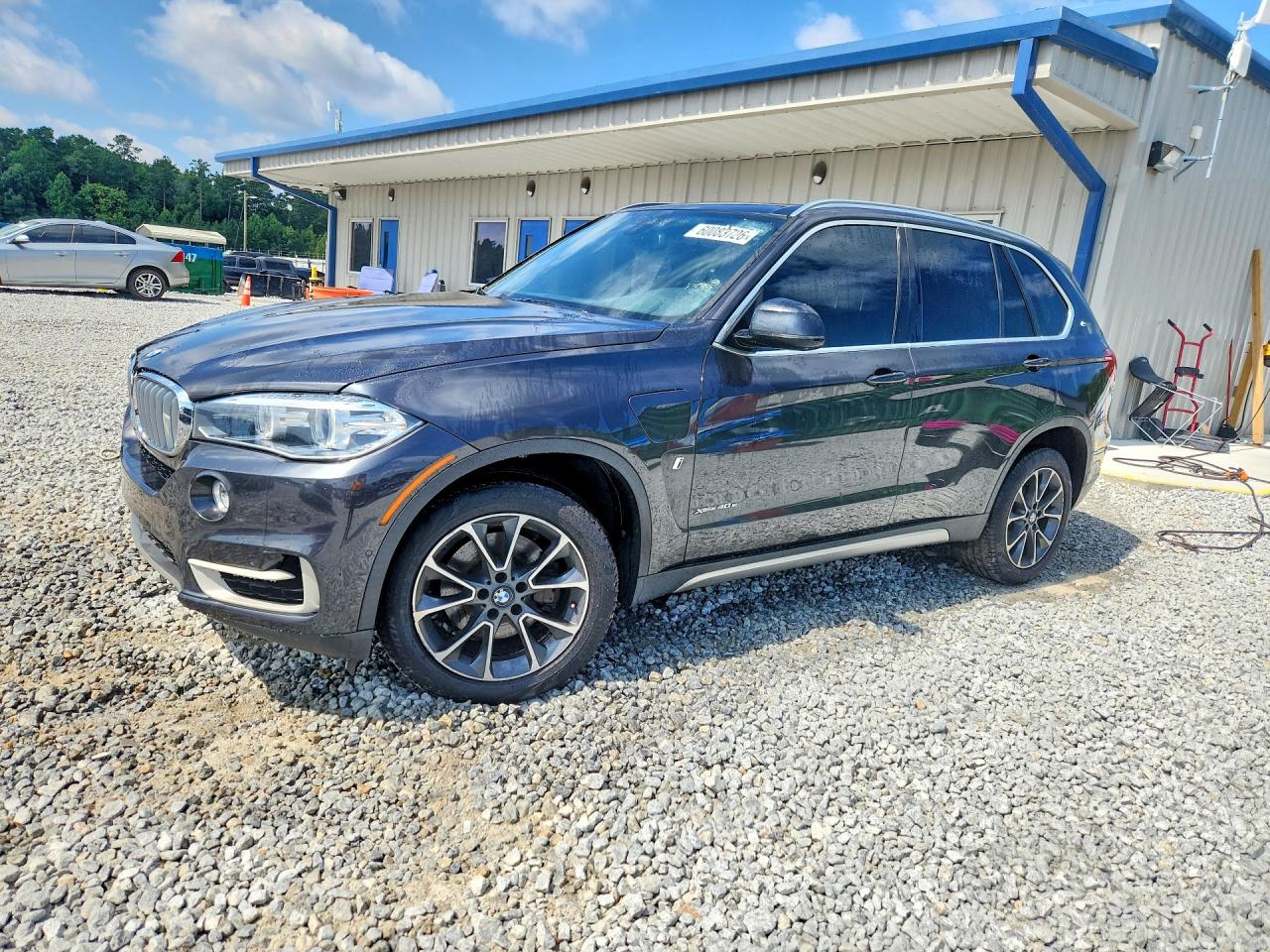 2018 BMW X5 xDrive40e, VIN 5UXKT0C58J0V98233 — Minor dents and scratches