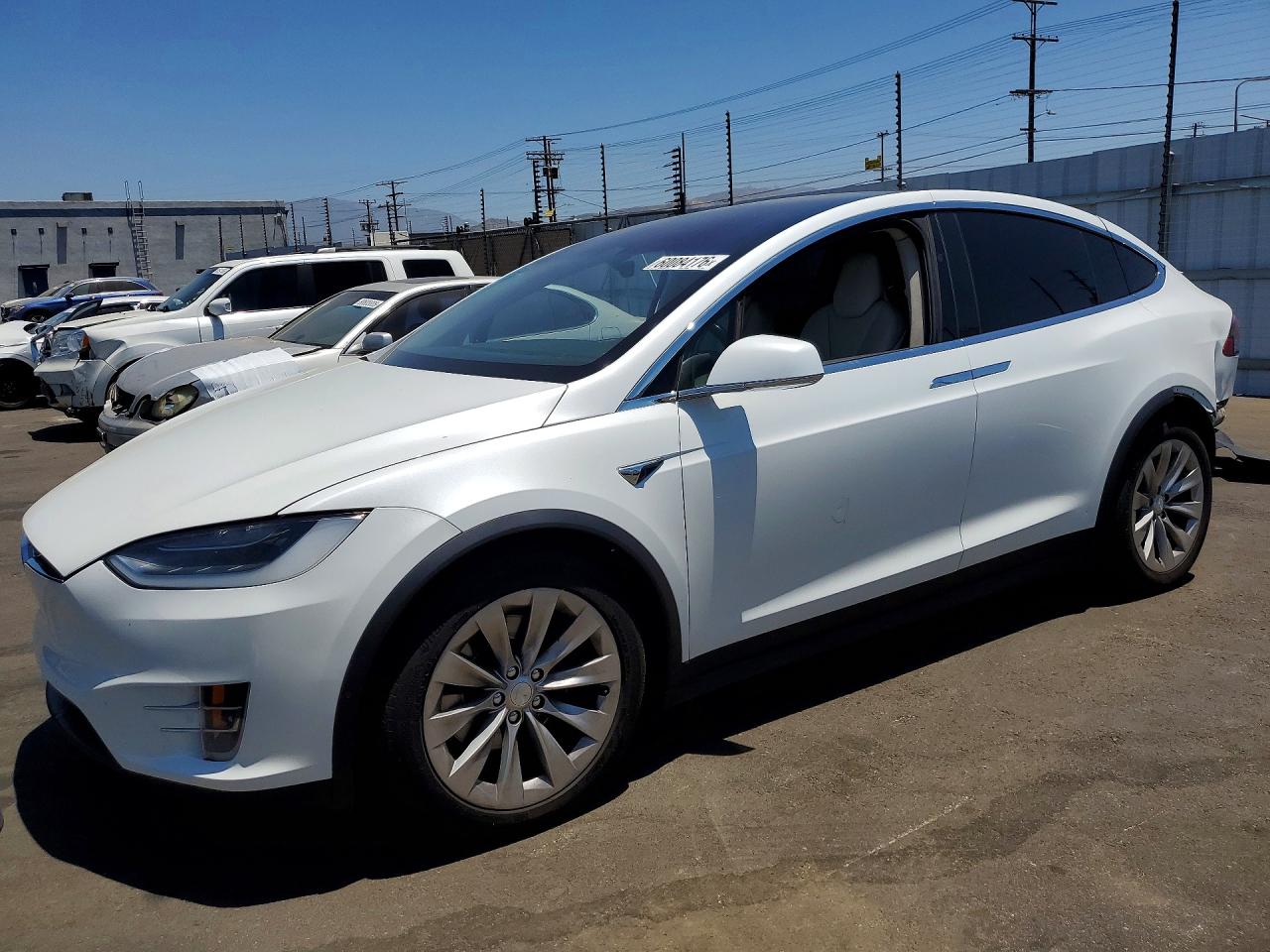 2019 Tesla Model X 75D, VIN 5YJXCAE25KF152947 — Rear end
