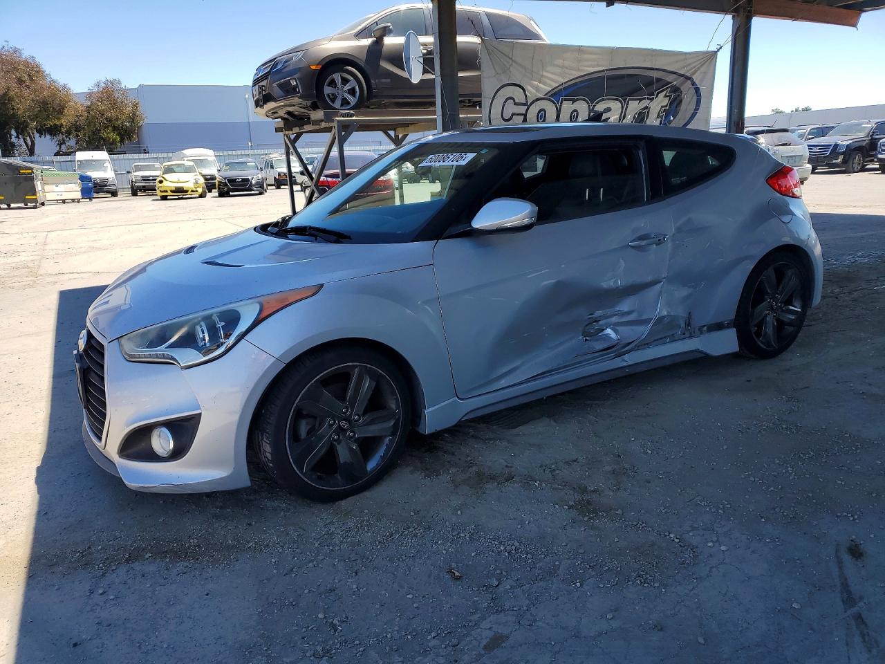 2015 Hyundai Veloster Turbo, VIN KMHTC6AEXFU225153 — Бок