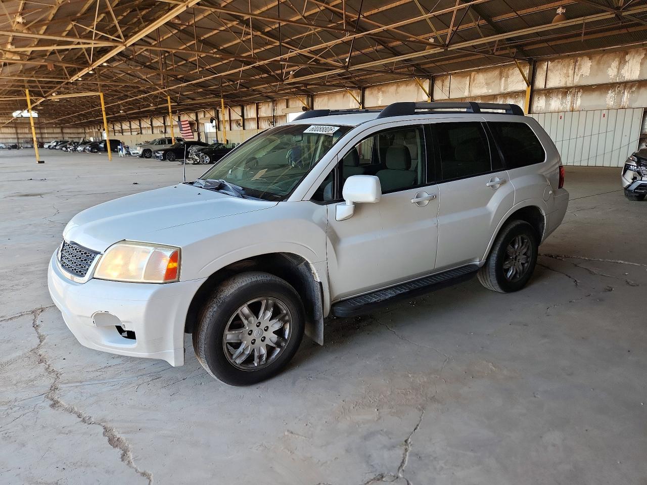 2011 Mitsubishi Endeavor LS, VIN 4A4JM2ASXBE016225 — Side