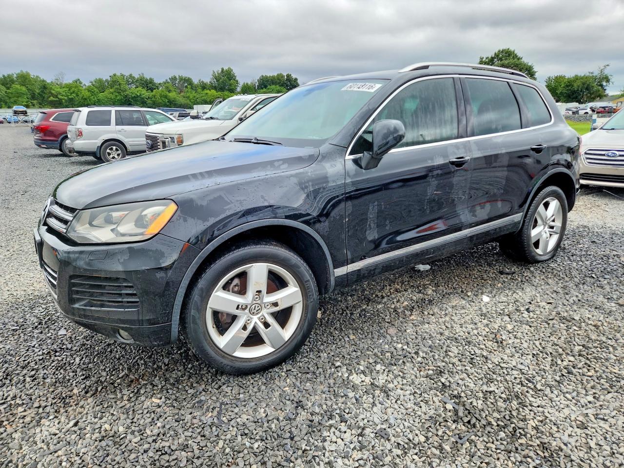 2011 Volkswagen Touareg Sport, VIN WVGFF9BP4BD005930 — Water / flood
