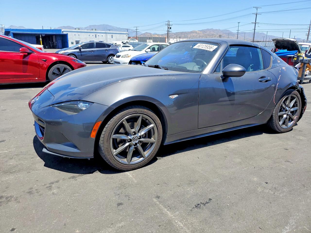 2017 Mazda MX-5 Miata Grand Touring, VIN JM1NDAM73H0108714 — Зад