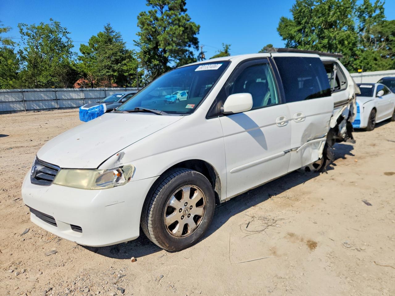 2003 Honda Odyssey EX, VIN 5FNRL18653B097005 — Side