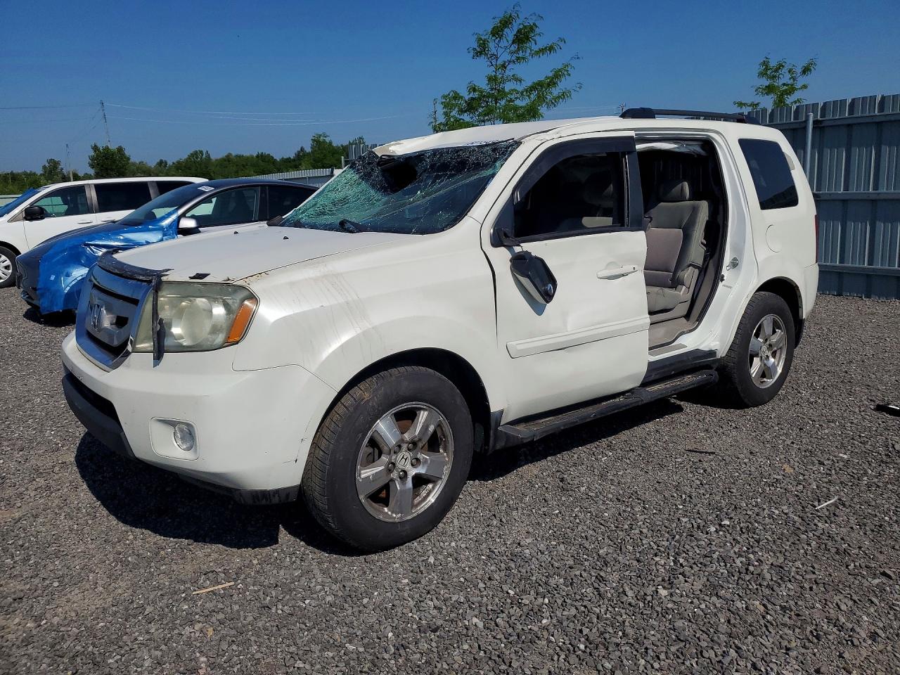 2011 Honda Pilot EX, VIN 5FNYF4H43BB505311 — Roof