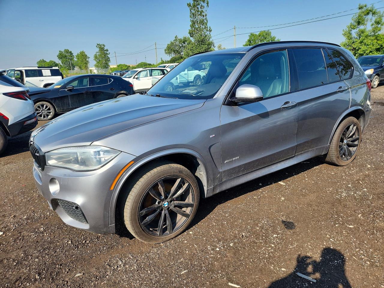 2014 BMW X5 xDrive35i, VIN 5UXKR0C55E0C24816 — Water / flood
