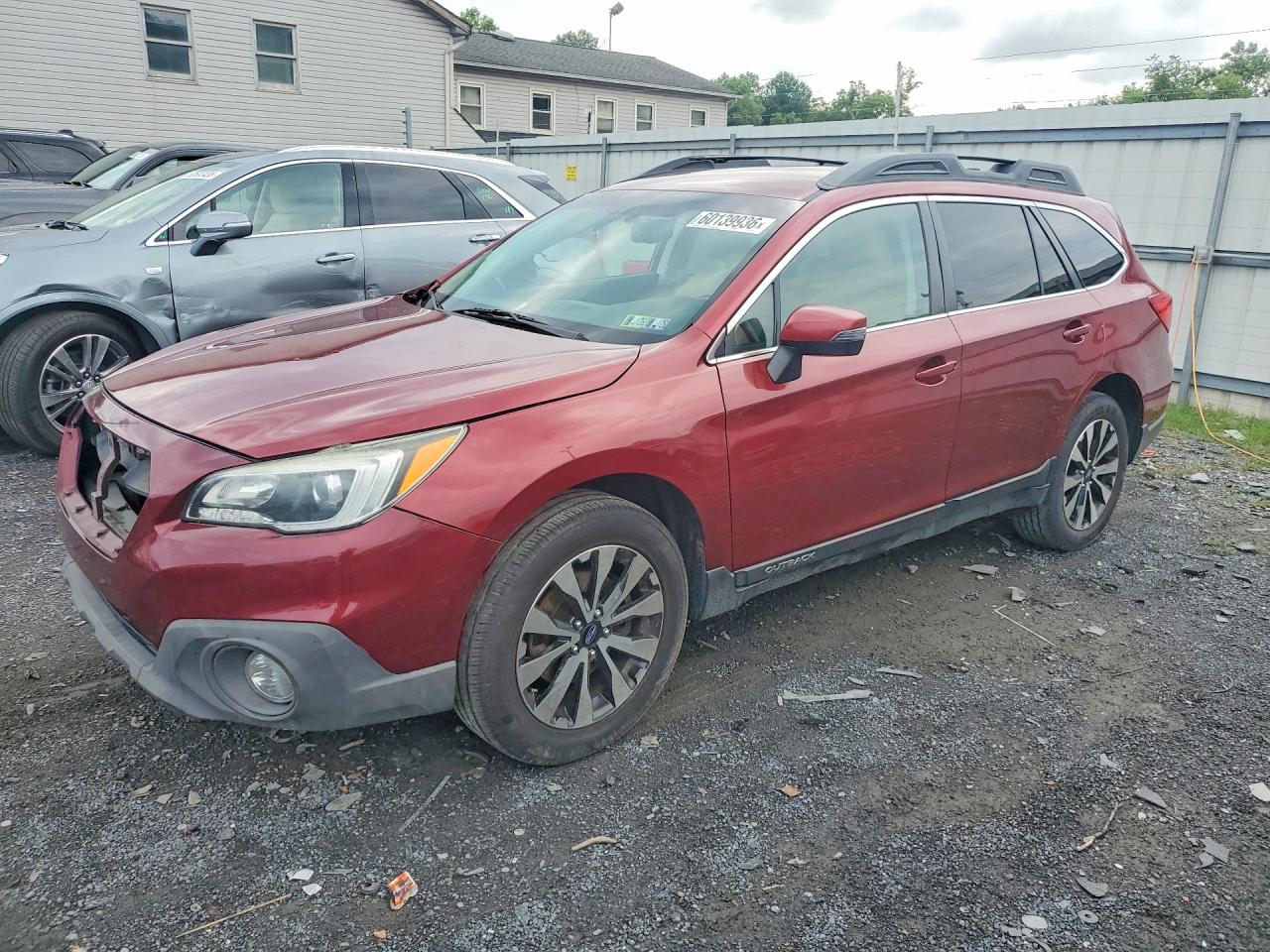 2016 Subaru Outback Limited, VIN 4S4BSAJC0G3248321 — Side