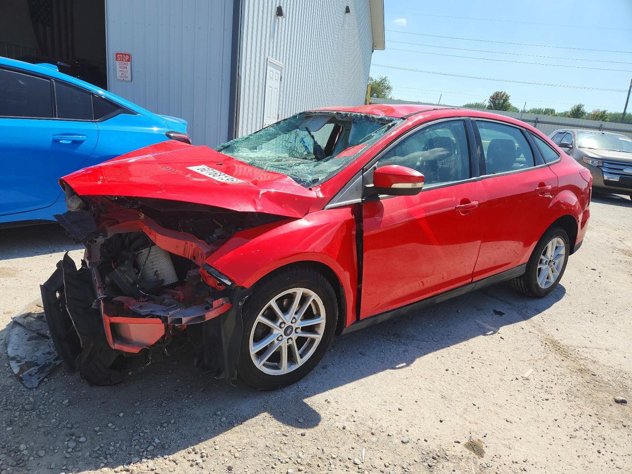 2015 Ford Focus SE, VIN 1FADP3F28FL244936 — Front end