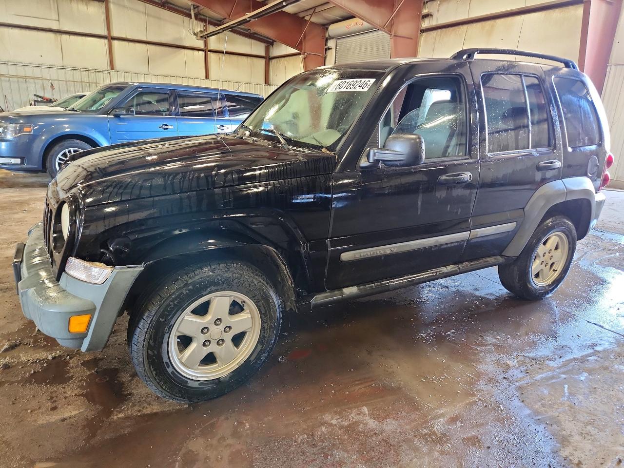 2006 Jeep Liberty Sport, VIN 1J4GK48K86W107058 — Side