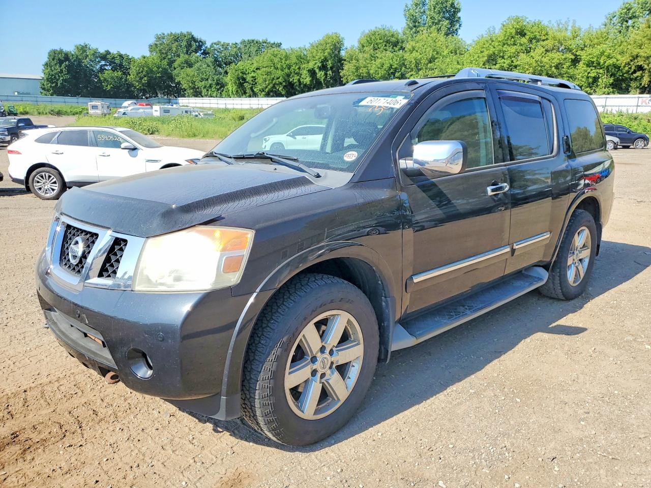 2012 Nissan Armada Platinum, VIN 5N1AA0NEXCN615499 — Side