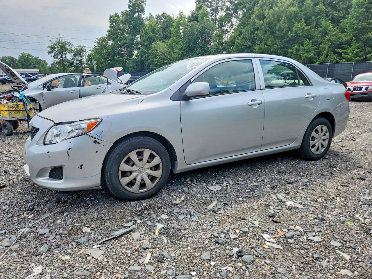 2009 Toyota Corolla, VIN JTDBL40EX9J022162 — Front end
