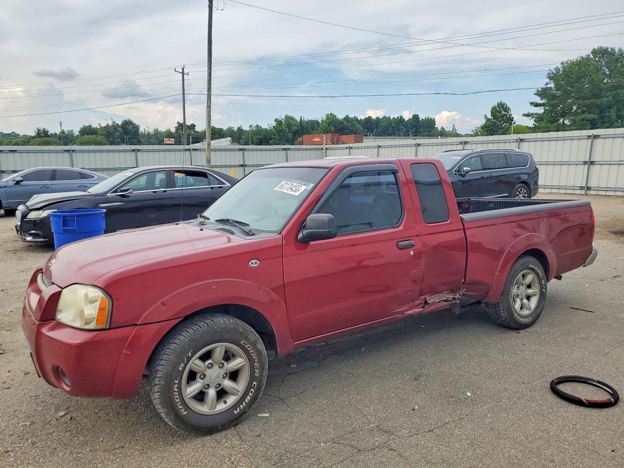 2004 Nissan Frontier XE, VIN 1N6DD26T14C471059 — Бок