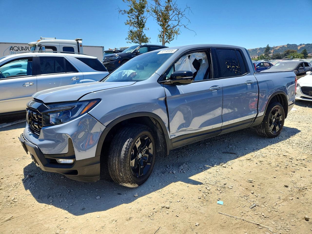 2025 Honda Ridgeline Black Edition, VIN 5FPYK3F83SB005426 — Front end