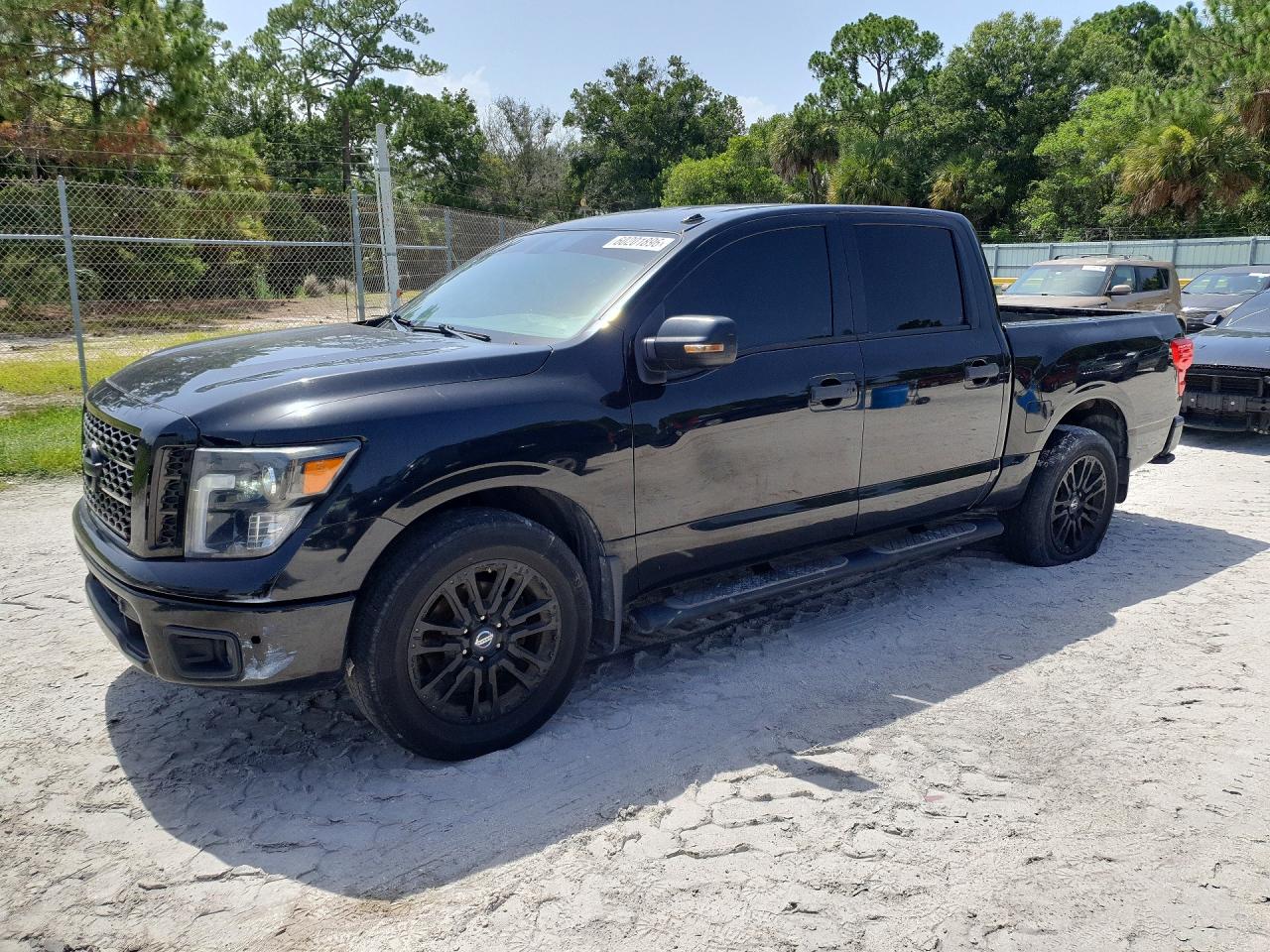2019 Nissan Titan SV, VIN 1N6AA1E68KN535200 — Front end