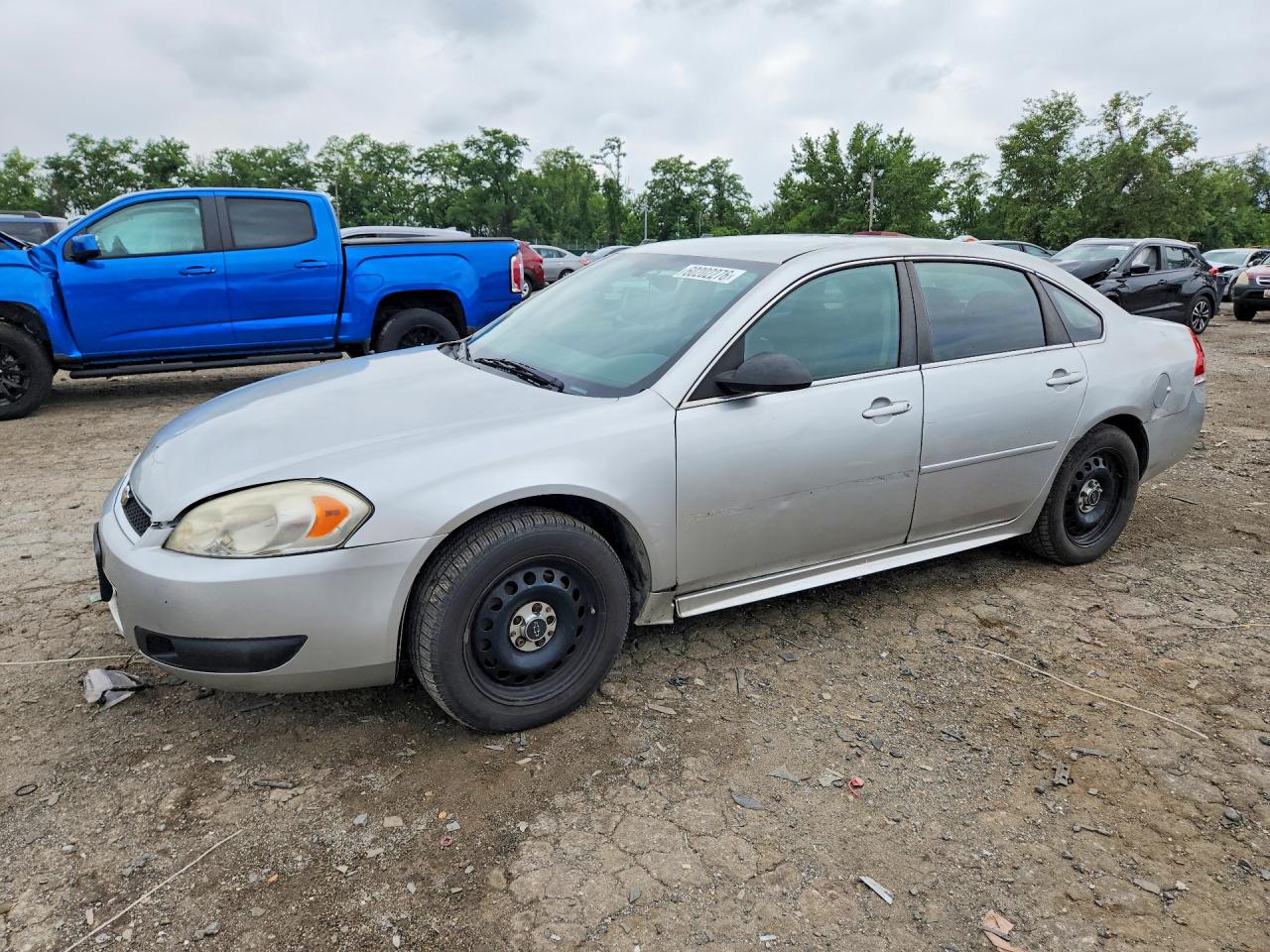 2014 Chevrolet Impala Police Police, VIN 2G1WD5E3XE1147803 — Side
