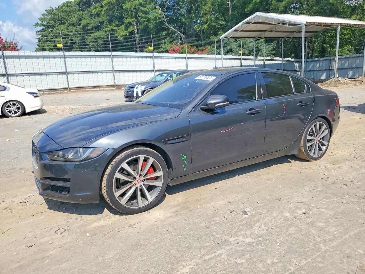2017 Jaguar XE 25t Prestige, VIN SAJAE4BG9HA963719 — Side