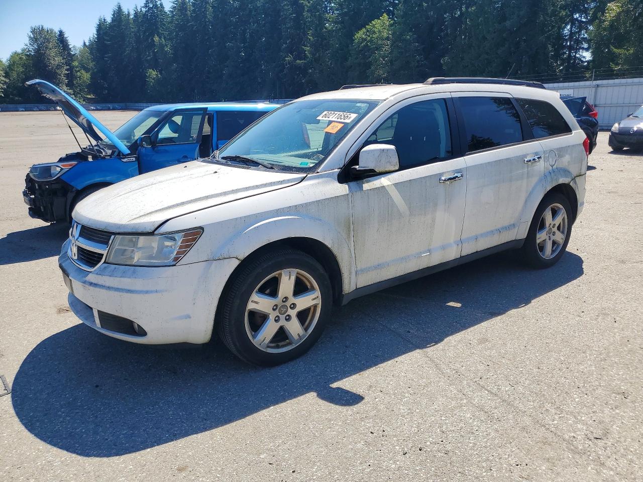2010 Dodge Journey SXT, VIN 3D4PH5FVXAT106955 — Minor dents and scratches