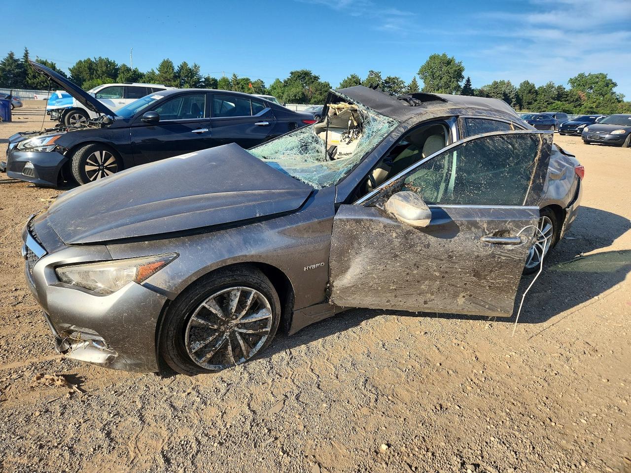 2015 Infiniti Q50 Hybrid Premium, VIN JN1AV7AR8FM850927 — Rollover