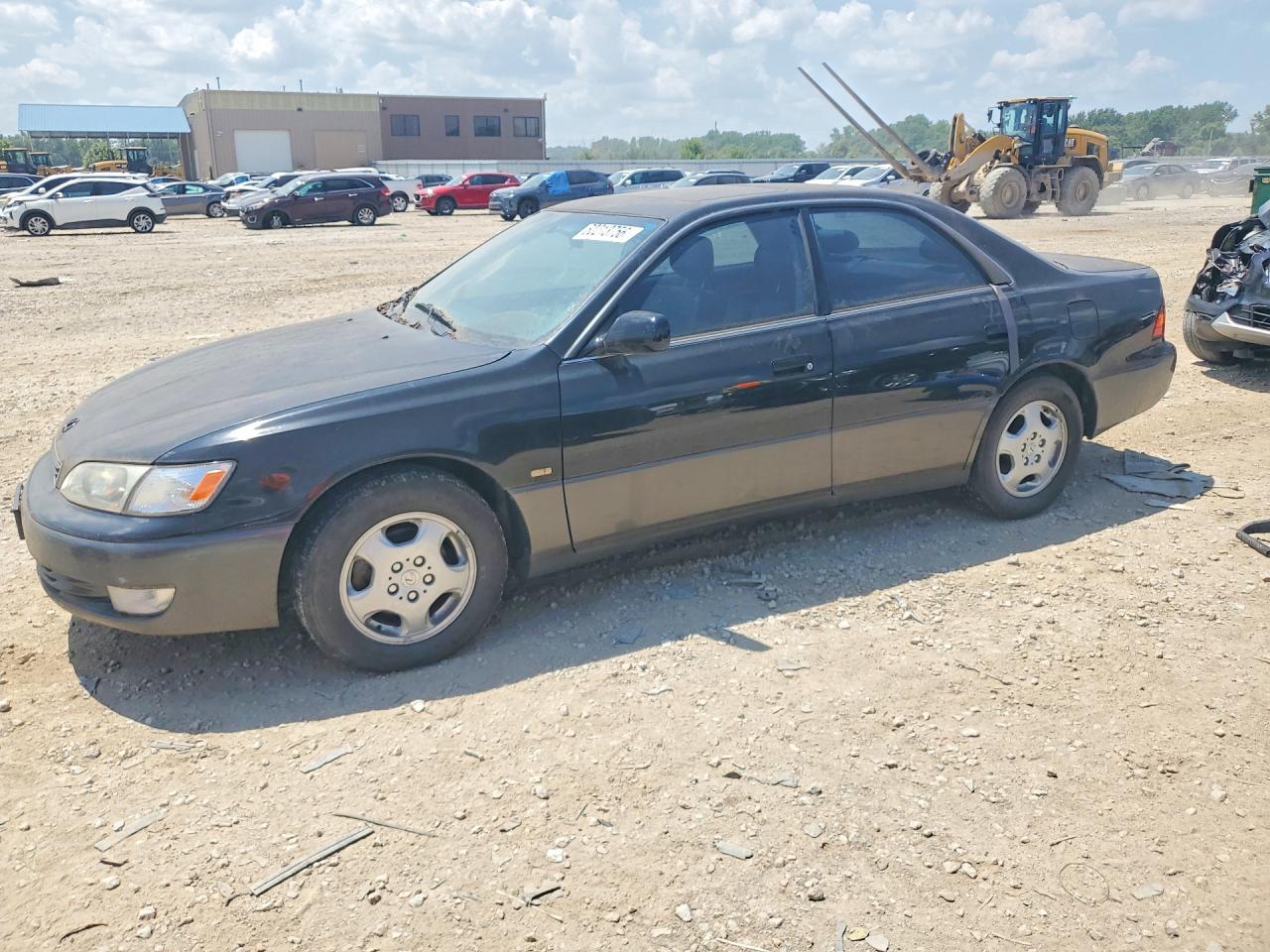 1999 Lexus ES 300, VIN JT8BF28G0X0197474 — Бок