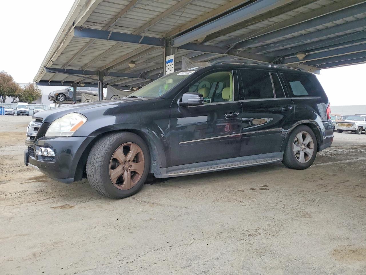 2011 Mercedes-Benz GL 450, VIN 4JGBF7BE8BA755236 — Minor dents and scratches