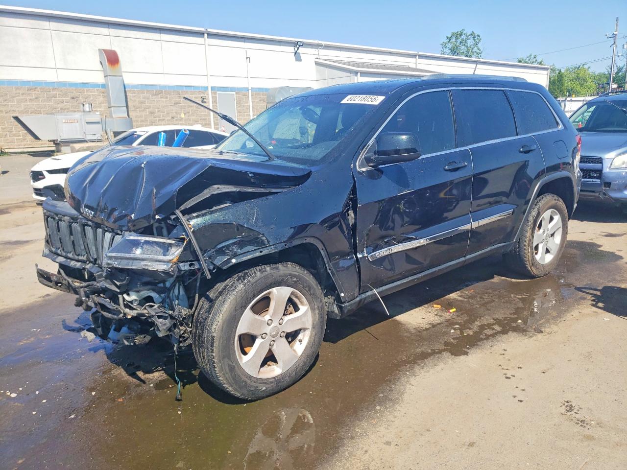 2013 Jeep Grand Cherokee Laredo, VIN 1C4RJFAG2DC599264 — Front end