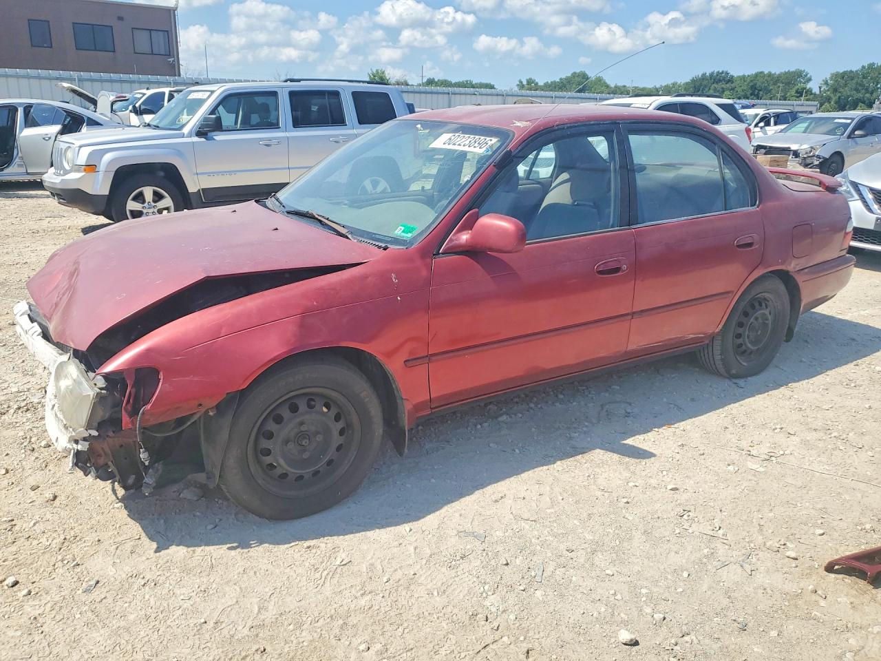 1997 Toyota Corolla DX, VIN 1NXBB02E8VZ583490 — Front end