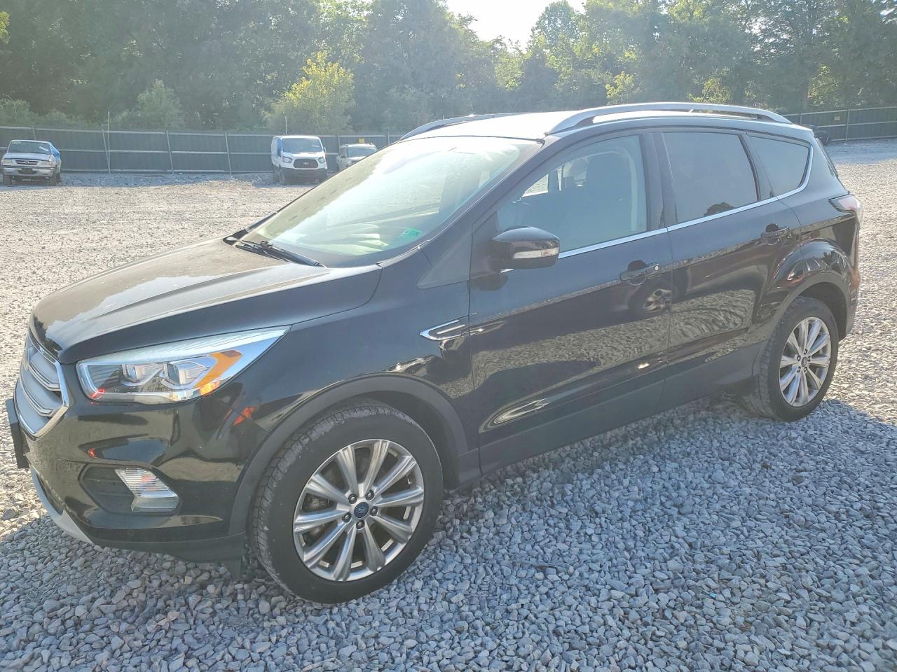 2018 Ford Escape Titanium, VIN 1FMCU9J93JUB30315 — Side