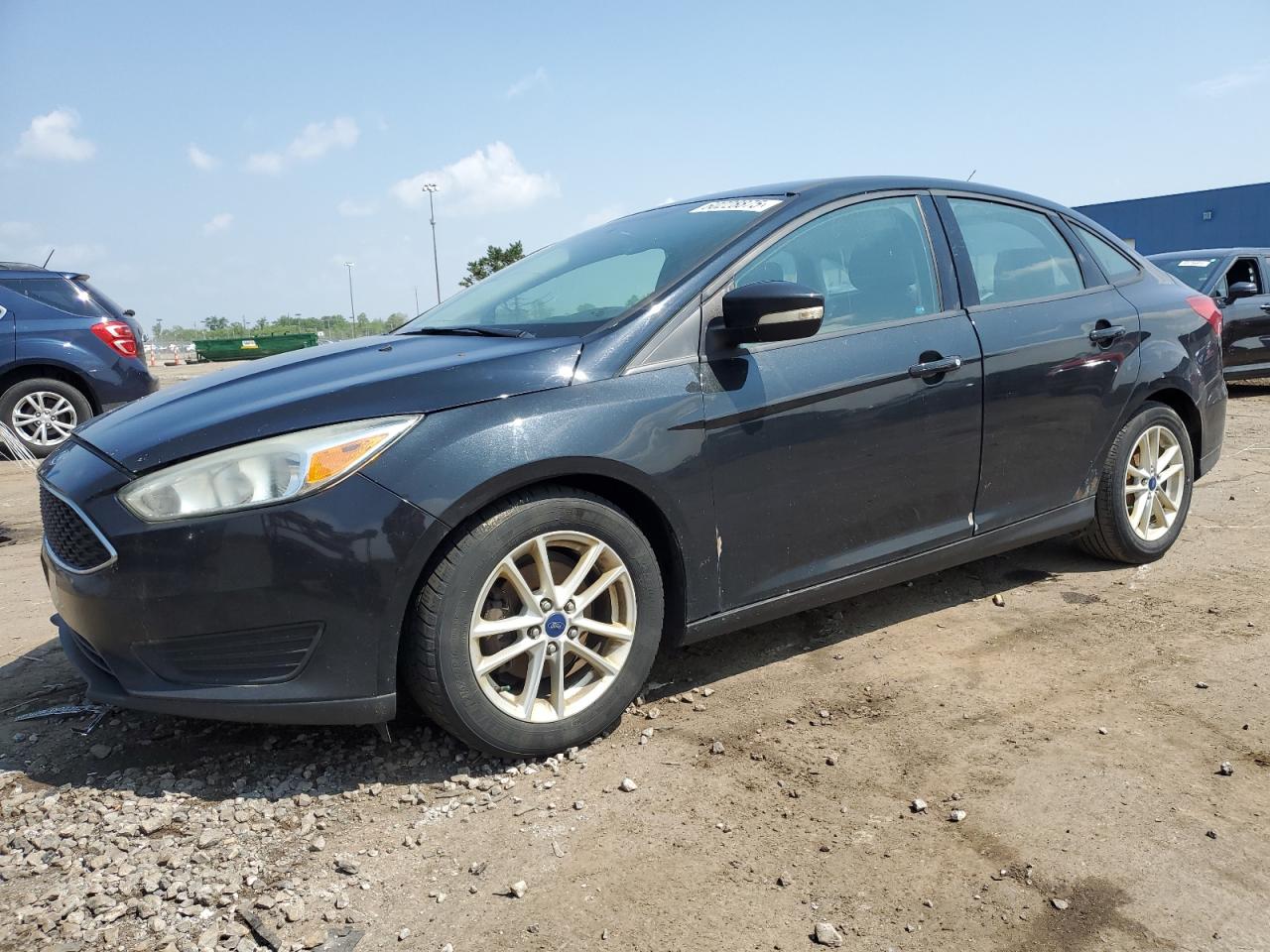 2016 Ford Focus SE, VIN 1FADP3F20GL378776 — Side