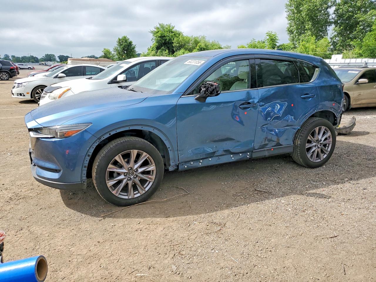 2019 Mazda CX-5 Grand Touring, VIN JM3KFBDM2K0615160 — Rear end