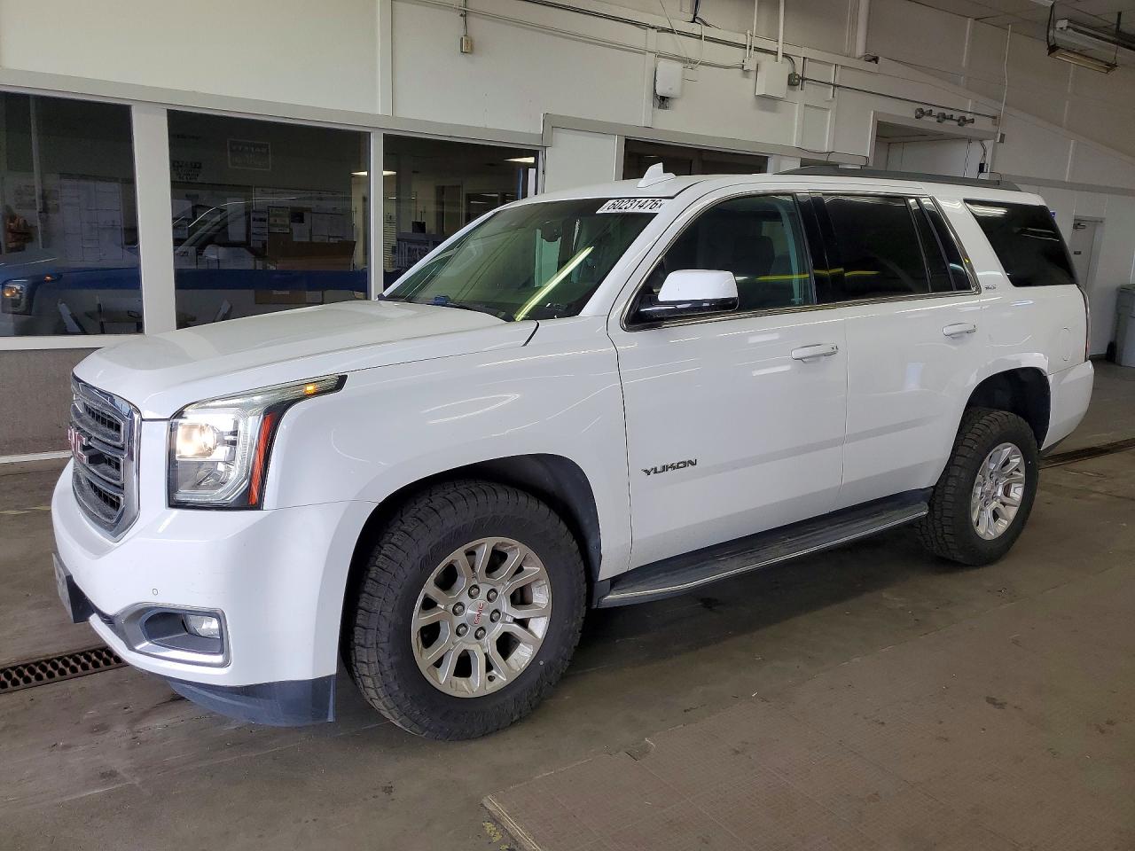 2017 GMC Yukon SLT, VIN 1GKS2BKC8HR124809 — Undercarriage