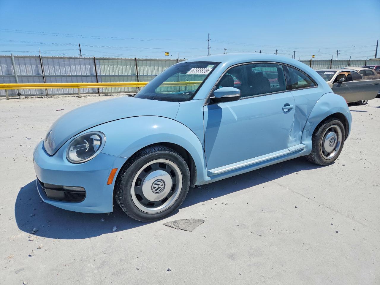 2012 Volkswagen Beetle 2.5L, VIN 3VWJX7AT3CM617179 — Side