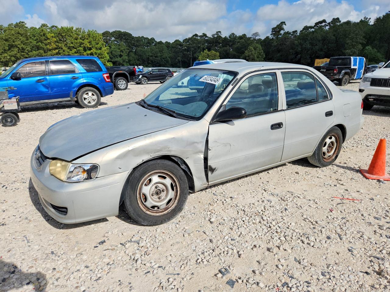2002 Toyota Corolla CE, VIN 1NXBR12E12Z604449 — Side