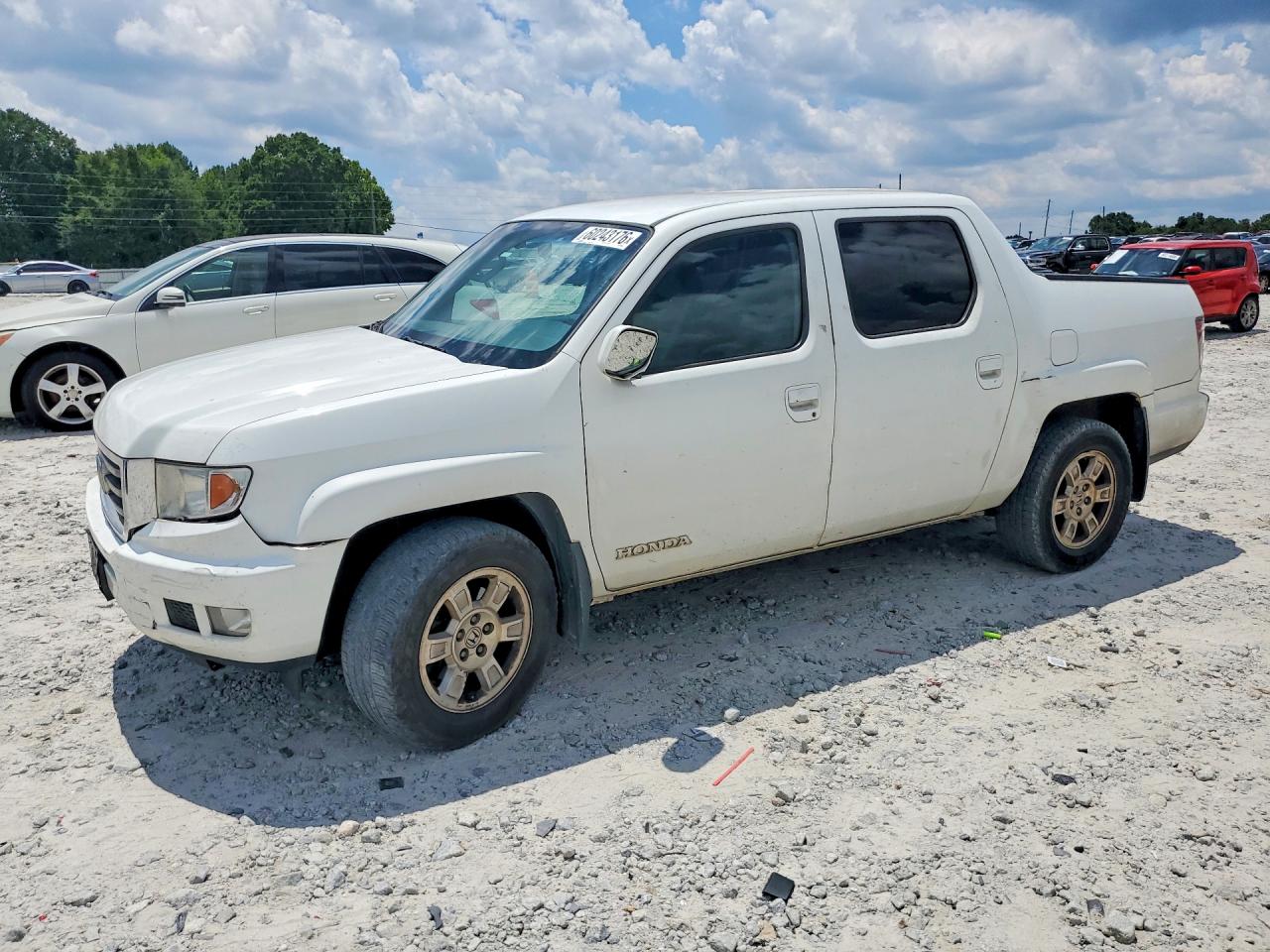 2012 Honda Ridgeline RTS, VIN 5FPYK1F44CB004272 — Front end