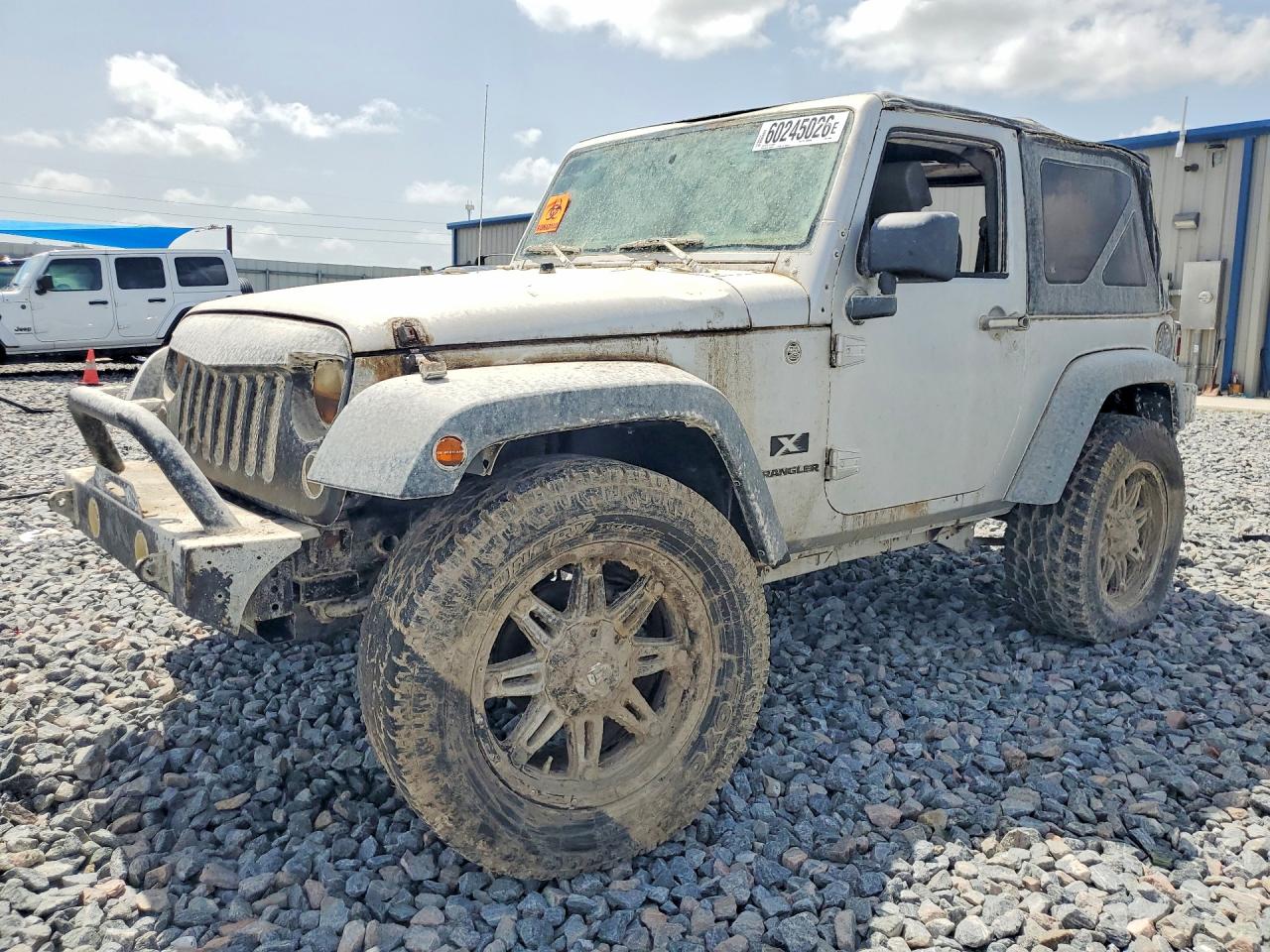 2009 Jeep Wrangler X, VIN 1J4FA24149L748066 — Vandalism