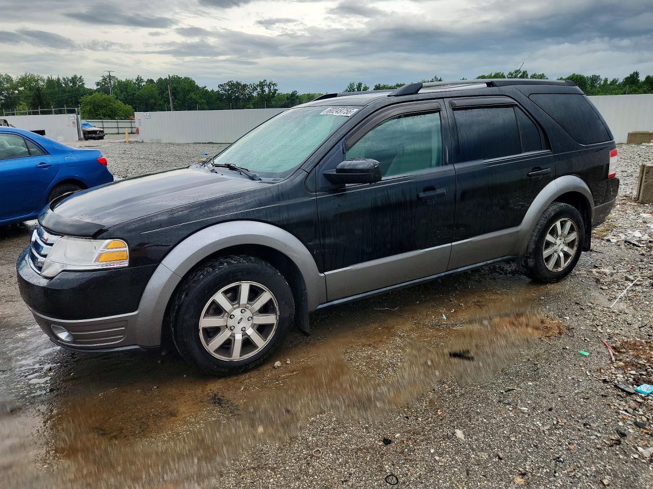 2009 Ford Taurus X SEL, VIN 1FMDK02W79GA02454 — Rear end