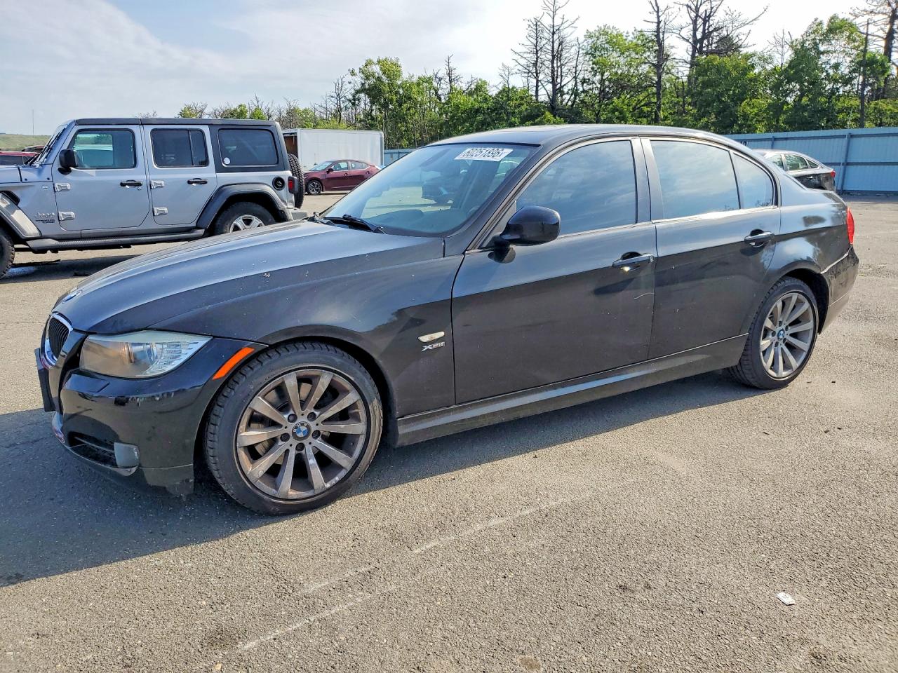 2011 BMW 3 Series 328i xDrive, VIN WBAPK7C5XBF087234 — Rear end