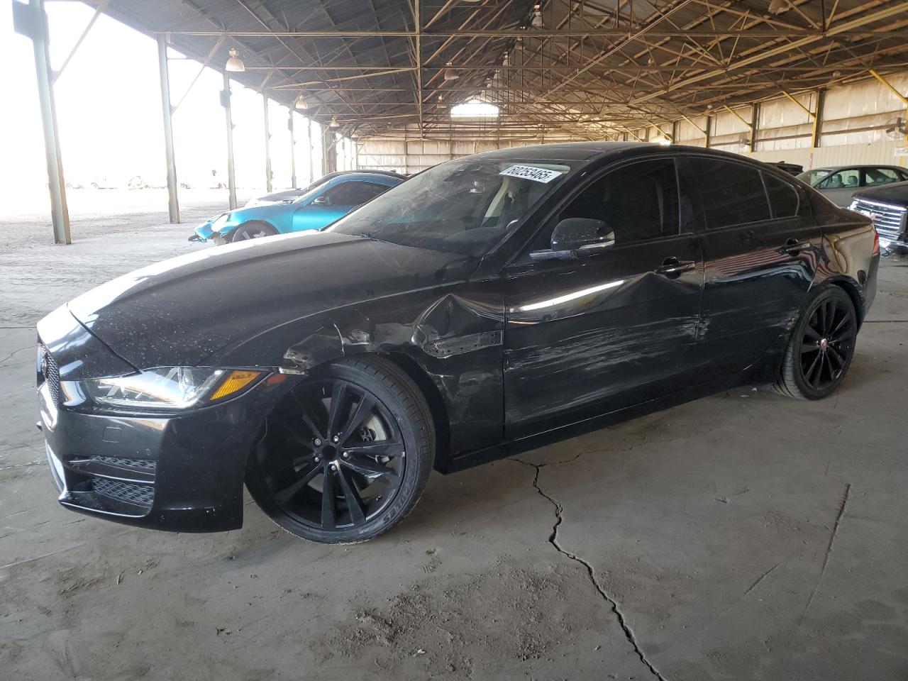 2017 Jaguar XE 35t Prestige, VIN SAJAE4BV3HA968087 — Side