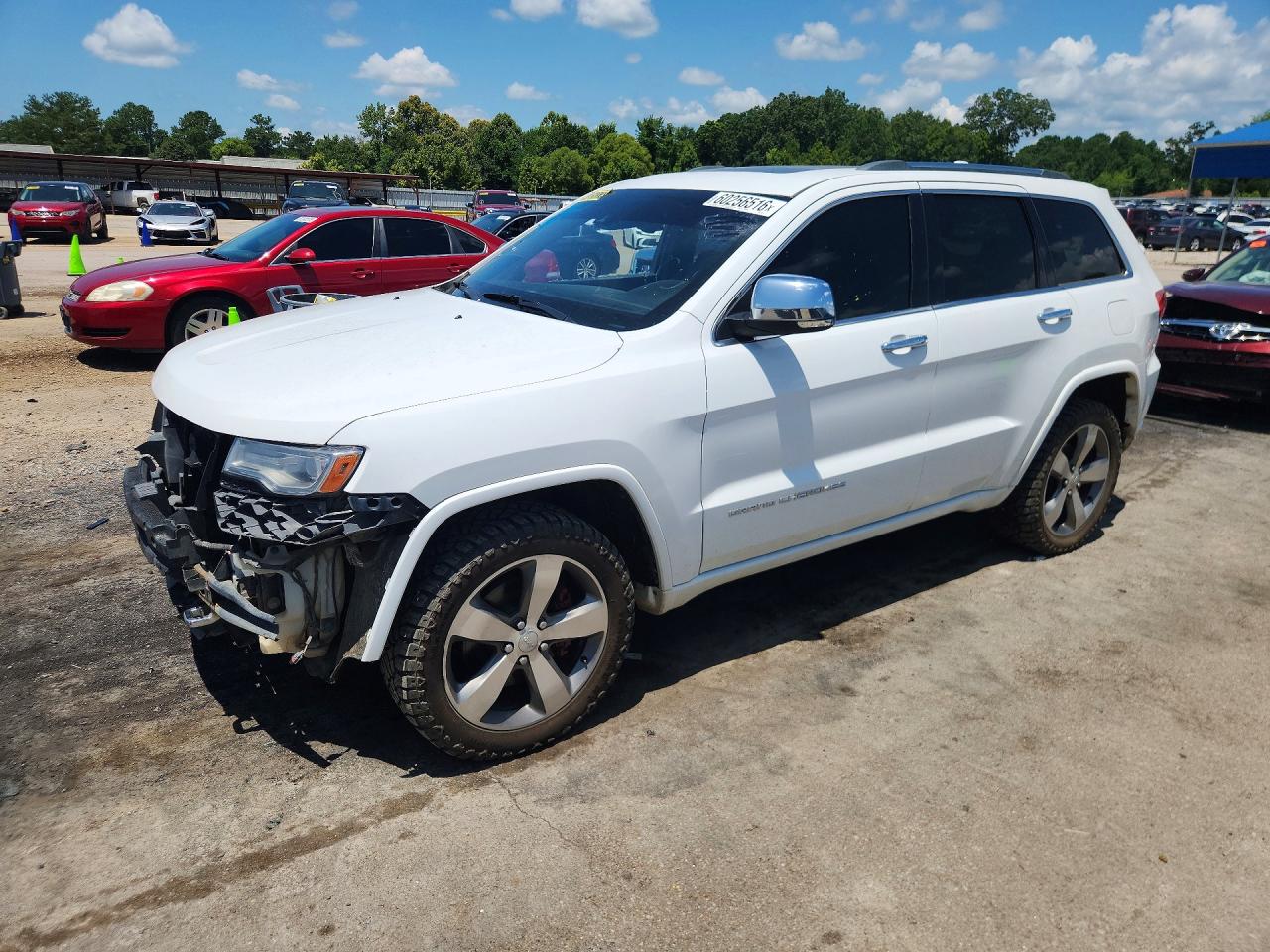 2014 Jeep Grand Cherokee Overland, VIN 1C4RJFCM5EC298623 — Water / flood