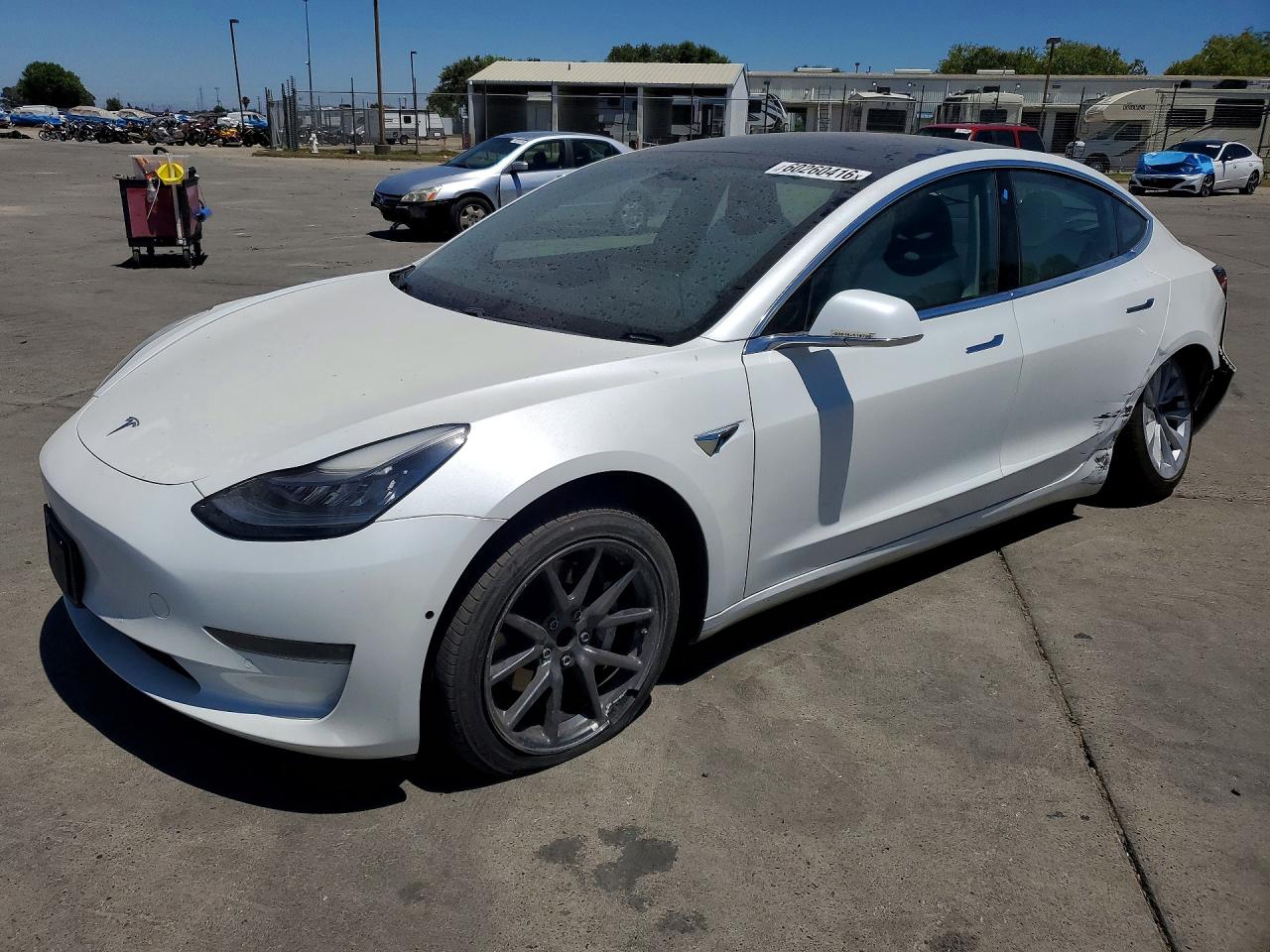 2020 Tesla Model 3 Standard Range Plus, VIN 5YJ3E1EA5LF744012 — Rear end