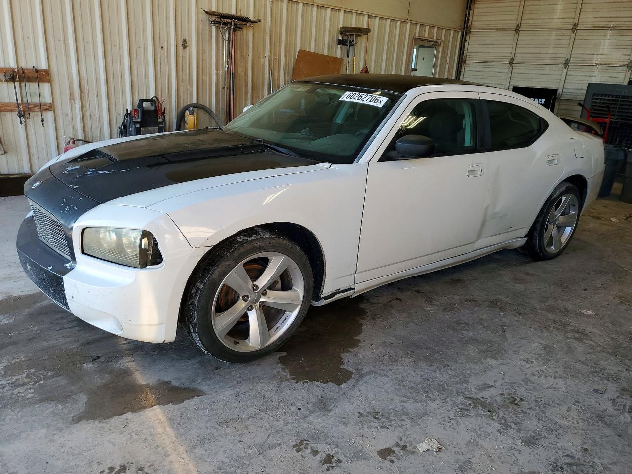 2010 Dodge Charger SXT, VIN 2B3CA3CV7AH257352 — Side