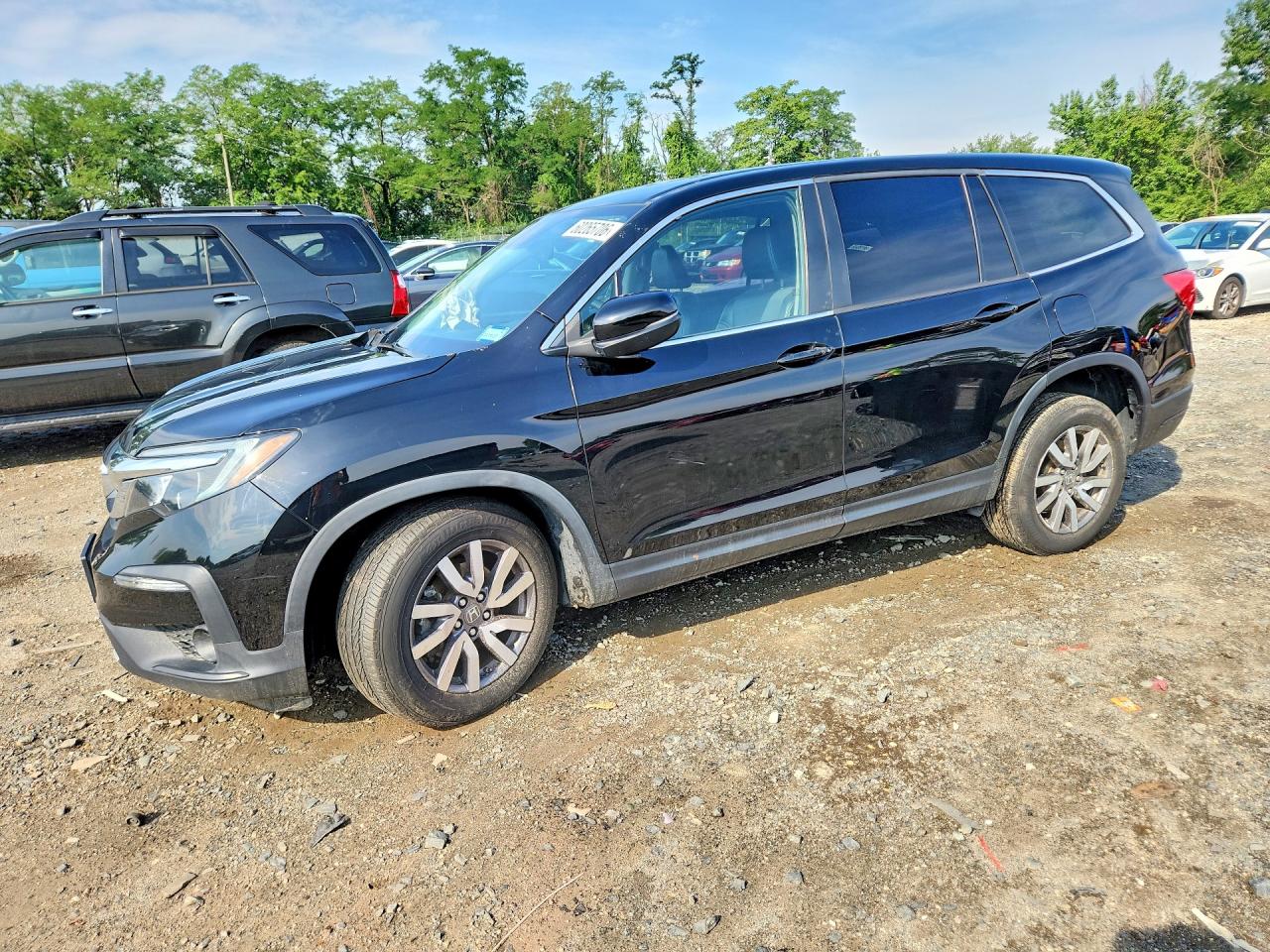2021 Honda Pilot EX-L, VIN 5FNYF6H52MB058719 — Днище