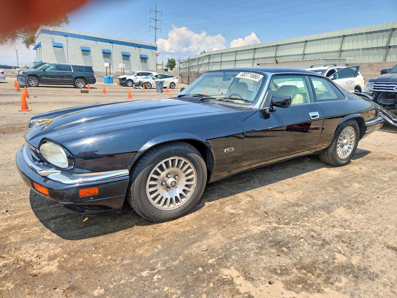 1995 Jaguar XJS, VIN SAJNX5341SC221199 — Side