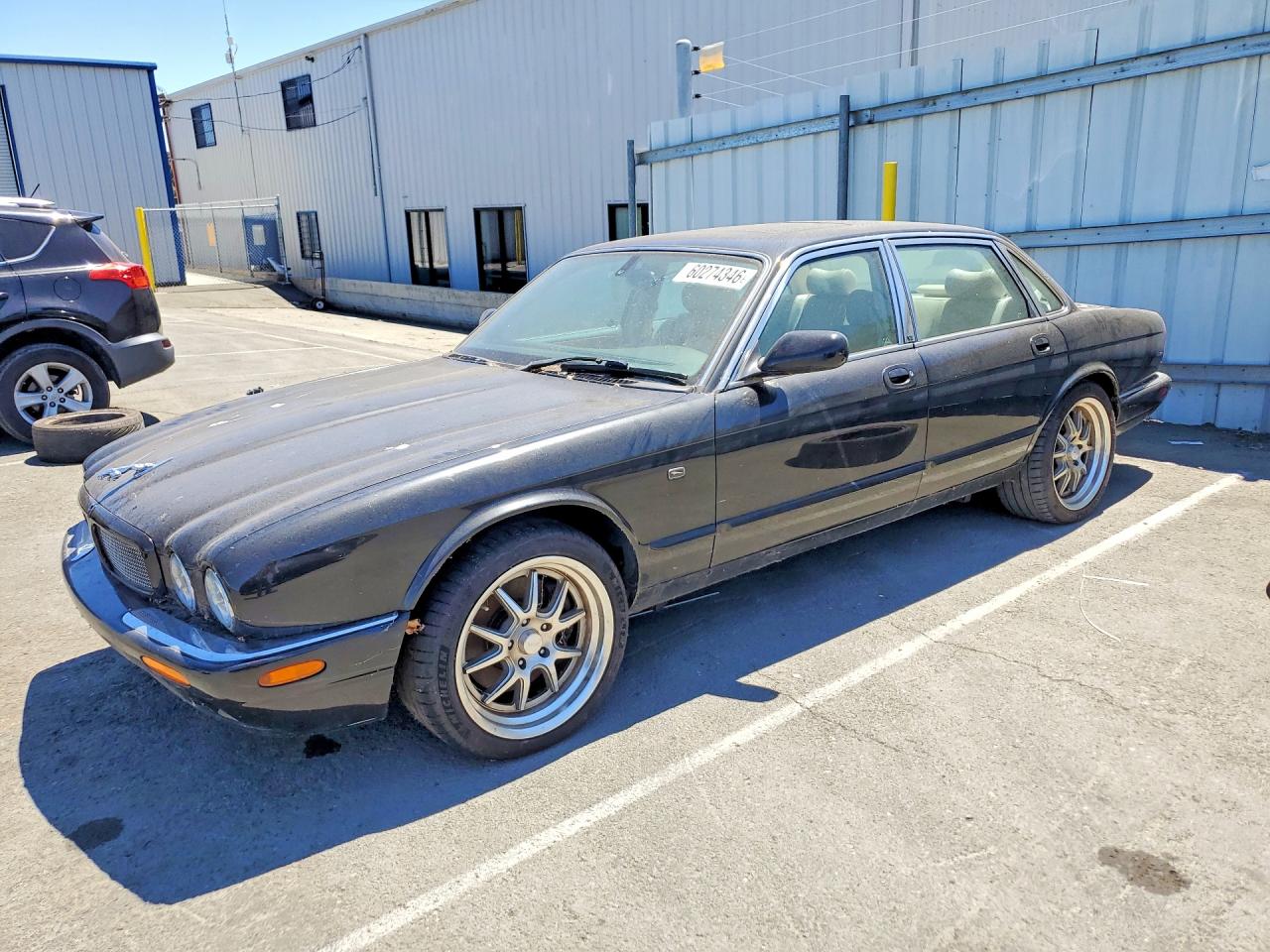 2002 Jaguar XJ R, VIN SAJDA15B32MF42532 — Minor dents and scratches