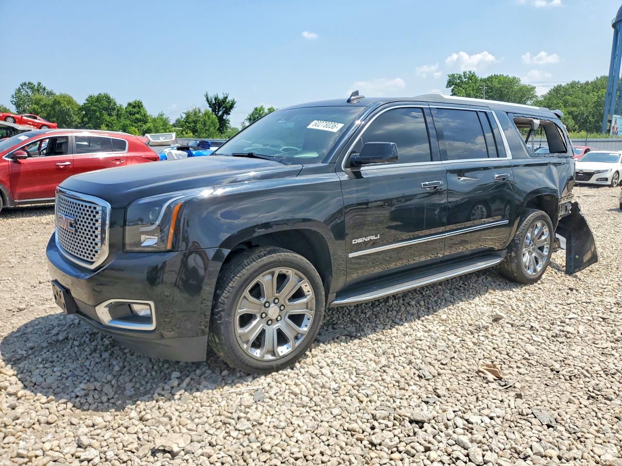 2016 GMC Yukon XL Denali, VIN 1GKS2HKJ1GR473777 — Rear end